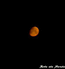 Красная луна на чёрном небе. Снимок сделан примерно в конце августа 2004го года